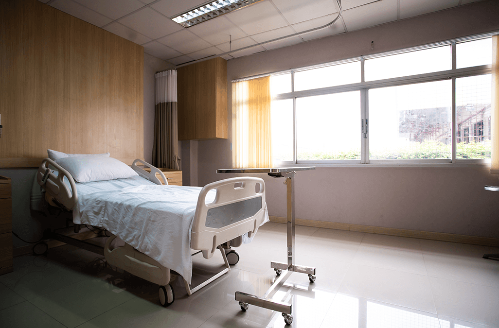 Photo of empty hospital bed