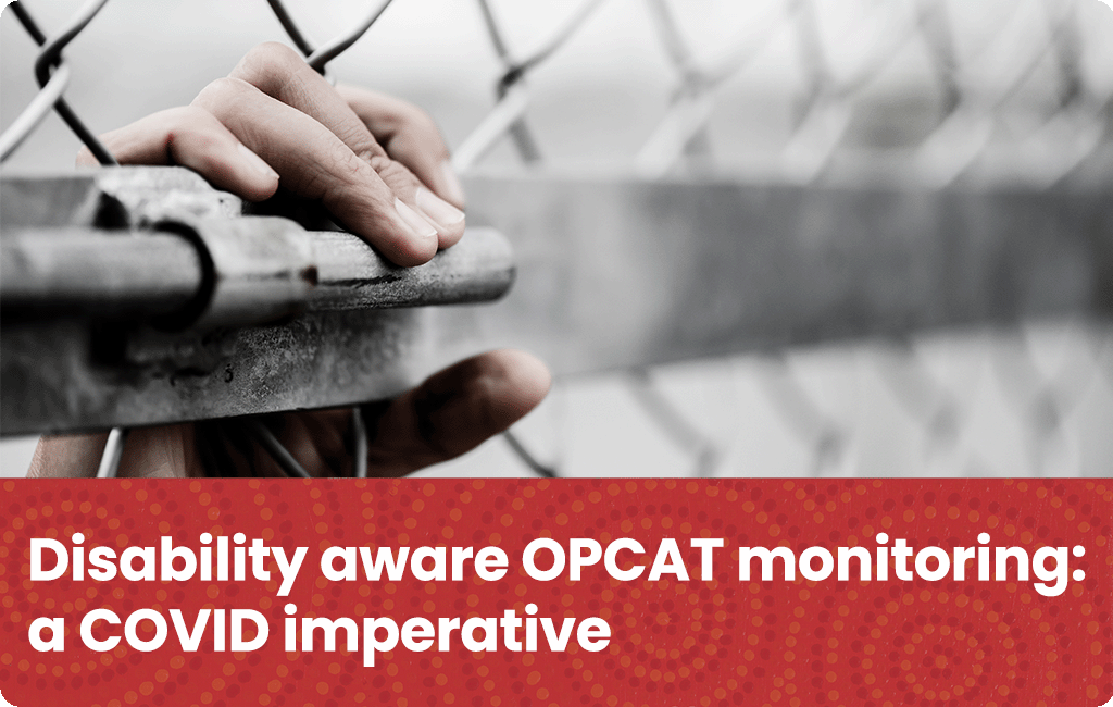 Hand holdinga lock on a chain link fence with text below "Disability aware OPCAT monitoring: a COVID imperative" on red Indigenous art background.
